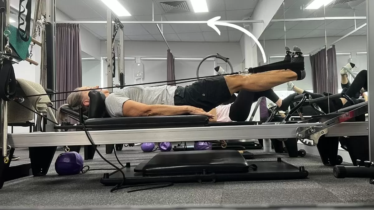 Clinical pilates reformer supine hamstring extension
